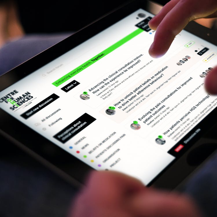 A tablet shows a visualisation of the online discussion forum.