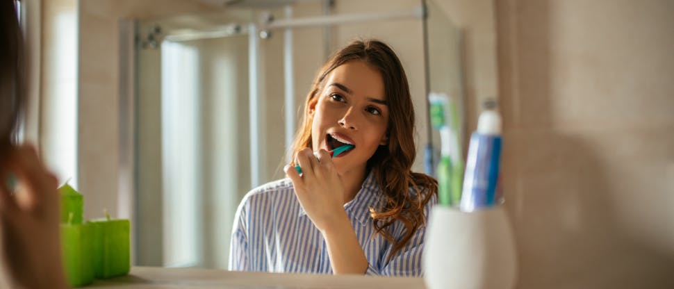 Patient brushing teeth 