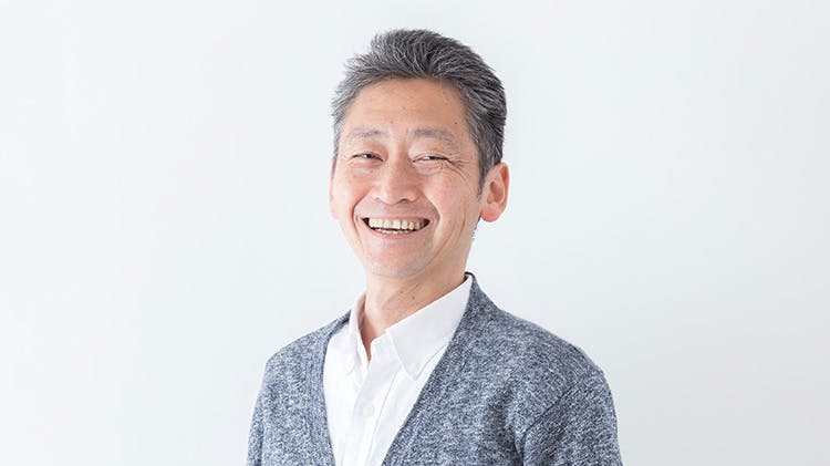 Grey-haired man smiling