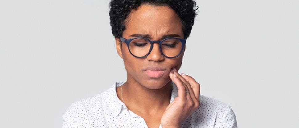 Woman with tooth ache