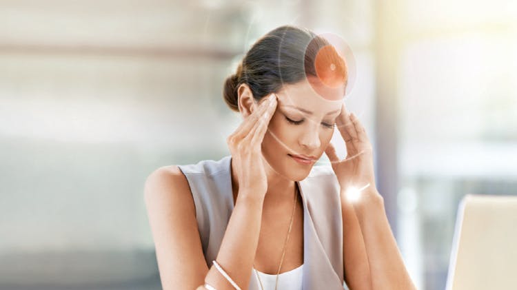 Woman with migraine