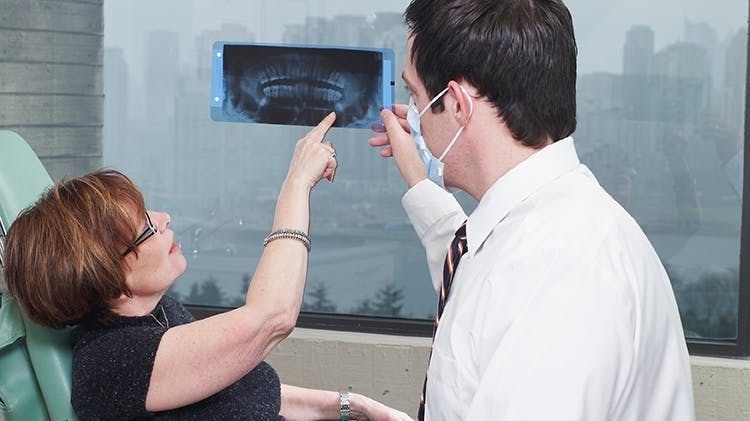 Dentist with patient
