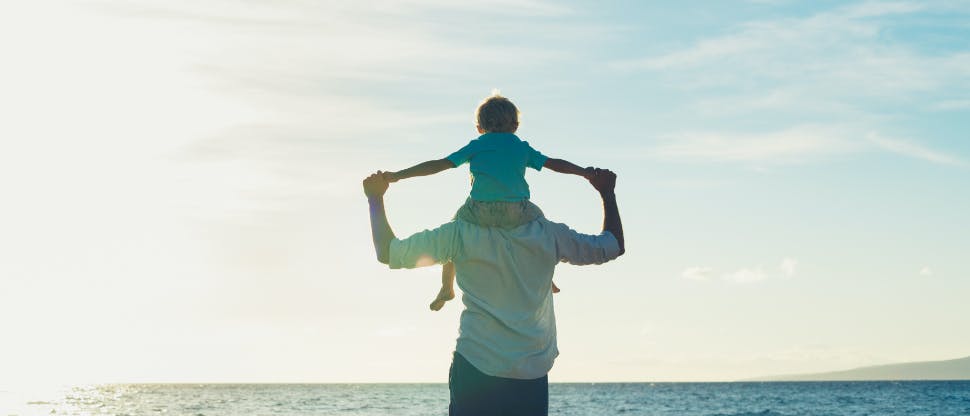 Father carrying his kid