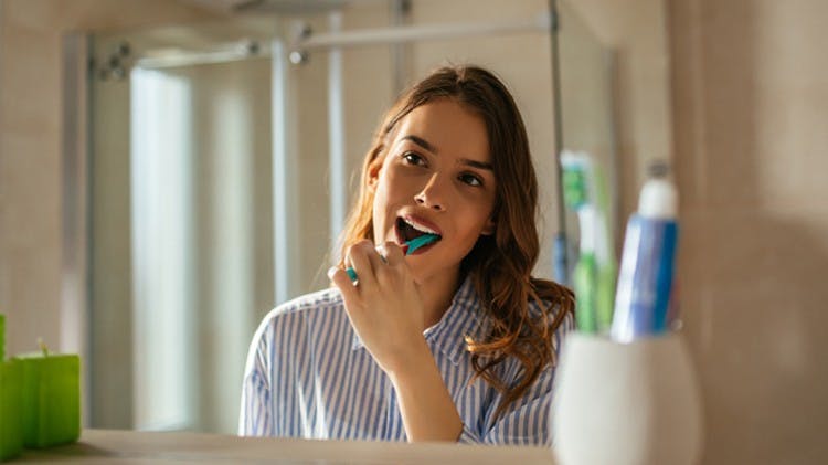 Woman brushing