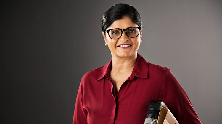 Lady with glasses smiling