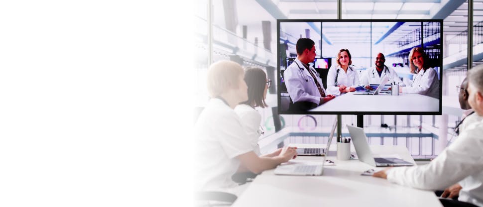 A group of doctors attending a video conference call