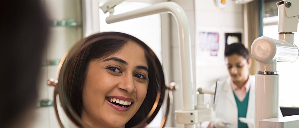 Dental patient at practice reception