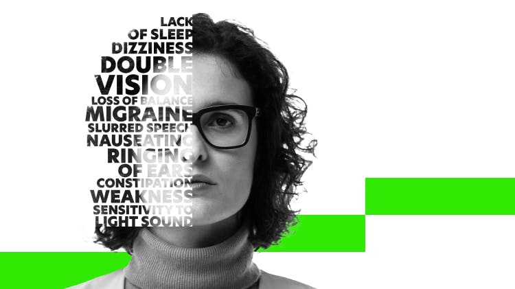 Close-up photo of a woman’s face, looking determined