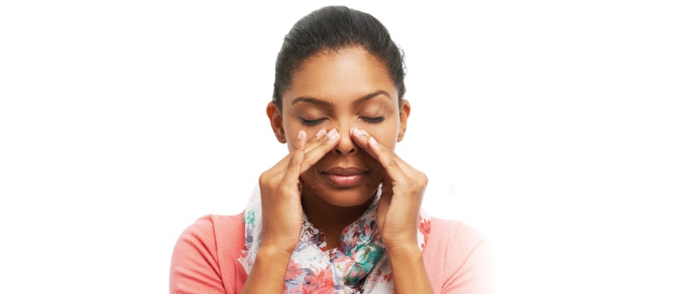 Woman touching sinus’