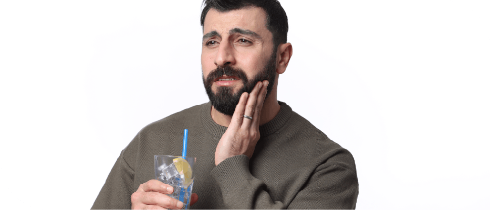 Male patient with tooth pain and drink