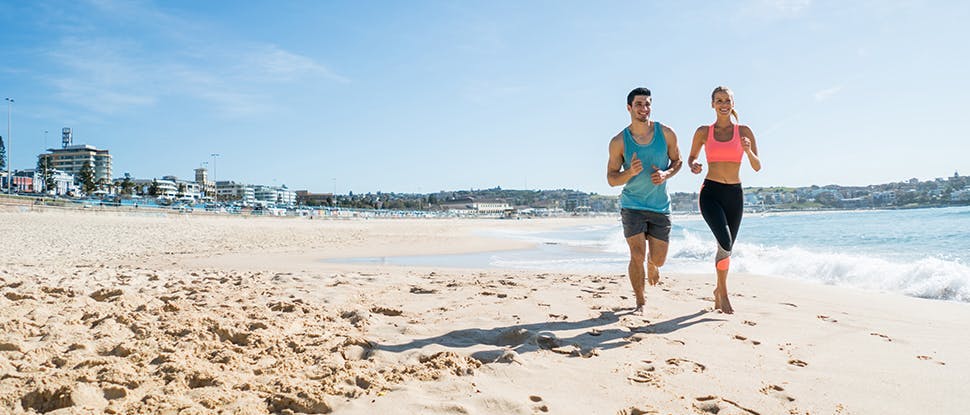 Couple running on the beach