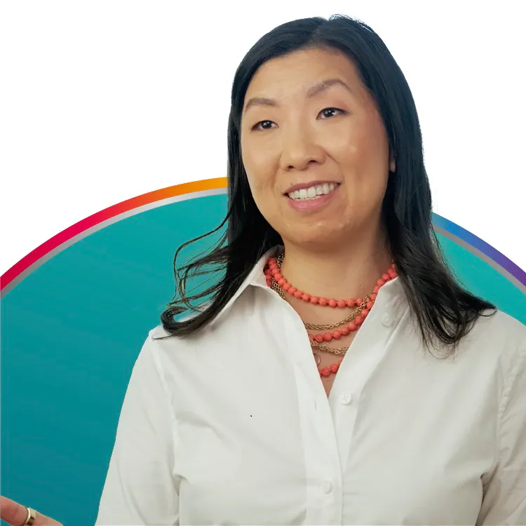 Image of Maggie Moon, Registered Dietician and neuronutrition expert. Maggie has dark brown hair and wears a white shirt with a necklace.