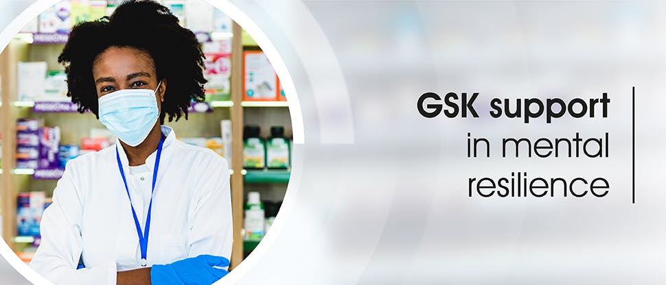 EXPERT_Mental Resilience_GHP Article_Header_GSK support A pharmacist wears a face mask to help protect herself against the COVID-19 virus.