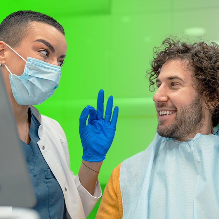 Image of hygienist consulting with a patient