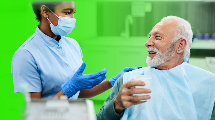 Image of a dental hygienist and a patient
