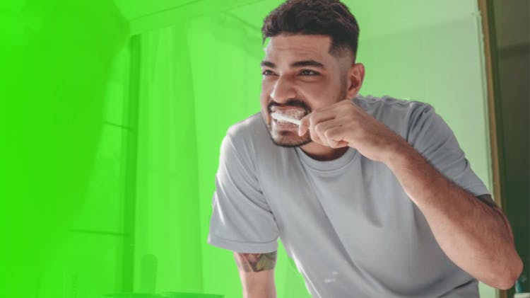 Image of a patient brushing teeth at home
