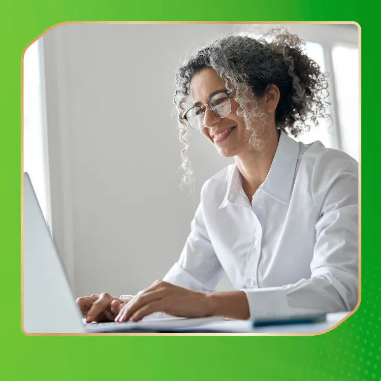 Older woman on laptop with header Denture Appliance and Denture Care