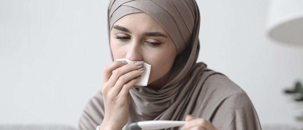 Woman with nasal congestion