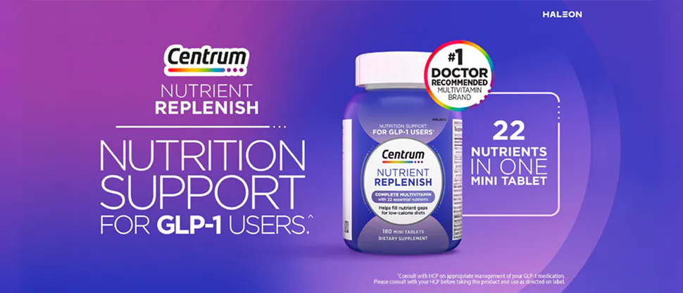Container of Centrum multivitamin tablets with a purple label.