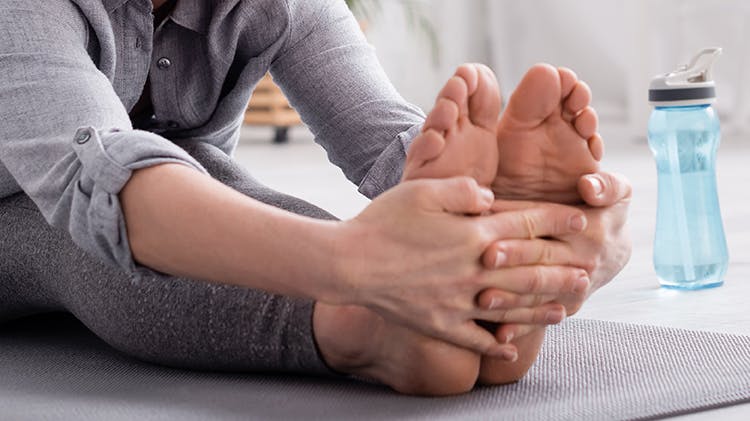 Person stretching feet and legs