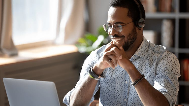 Image of a man looking at a computer