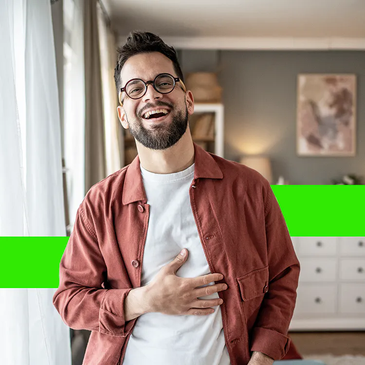 Man smiling in a room
