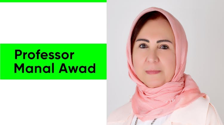 Headshot of Professor Manal Awad, a woman with brown hair mostly covered by a dark red headscarf. She wears a maroon top or dress.