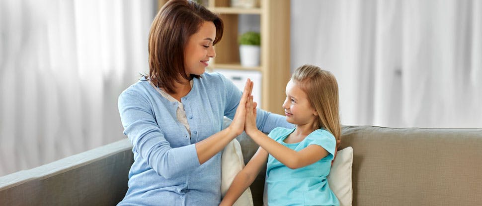 Happy child with her mother