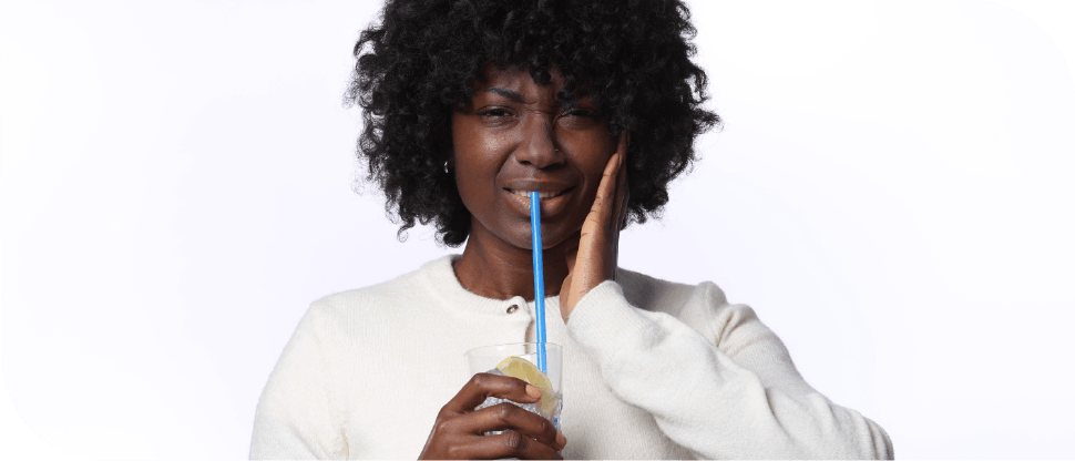 Female with sharp tooth pain and drink