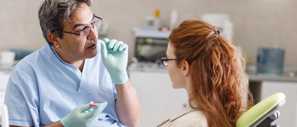 Dentist and patient_970*416px La technologie Adaptagrip