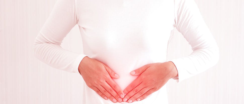 gastroenteritis-in-woman-and-she-touching-her-abdomen-symptom-of-pain