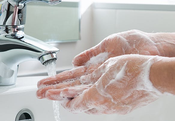 Hands being washed