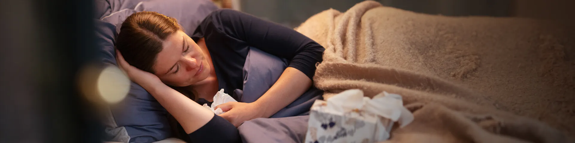 Woman with cold resting