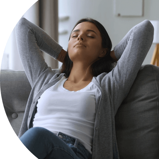 Young woman relaxing on a sofa