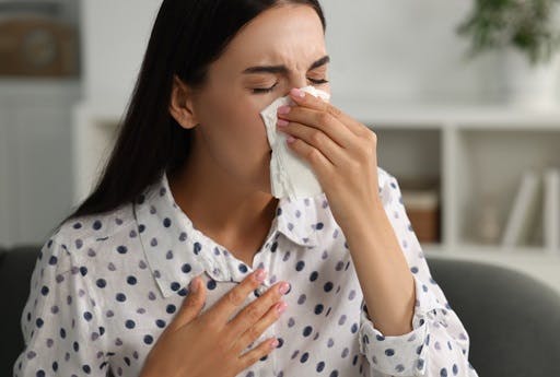 Woman has nasal congestion