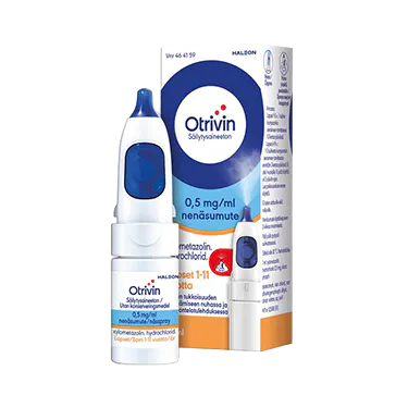 Woman rubs her nose that might be a symptom of sinusitis.