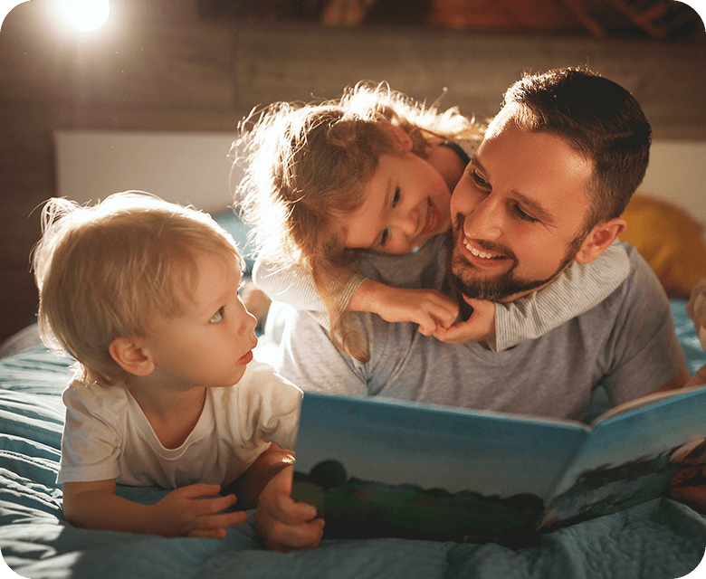 Evening family reading, father reads to children