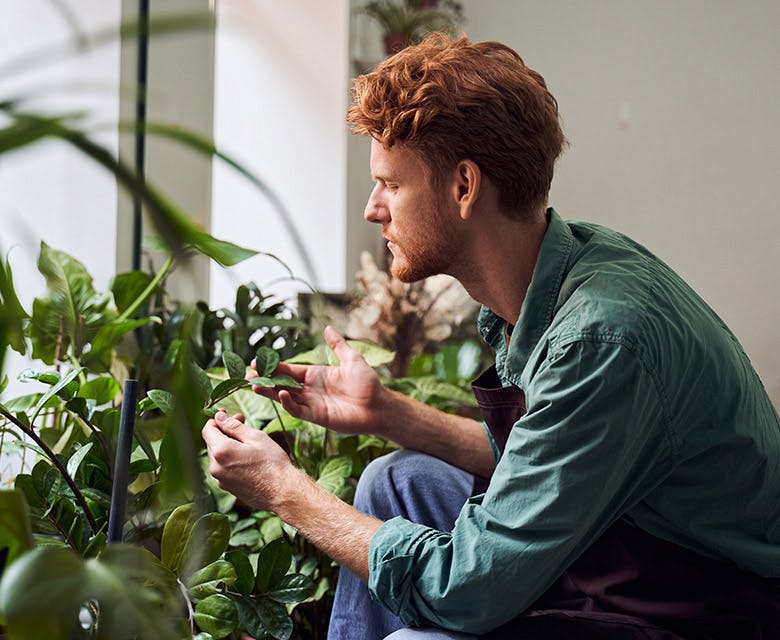 man spending time with his plants