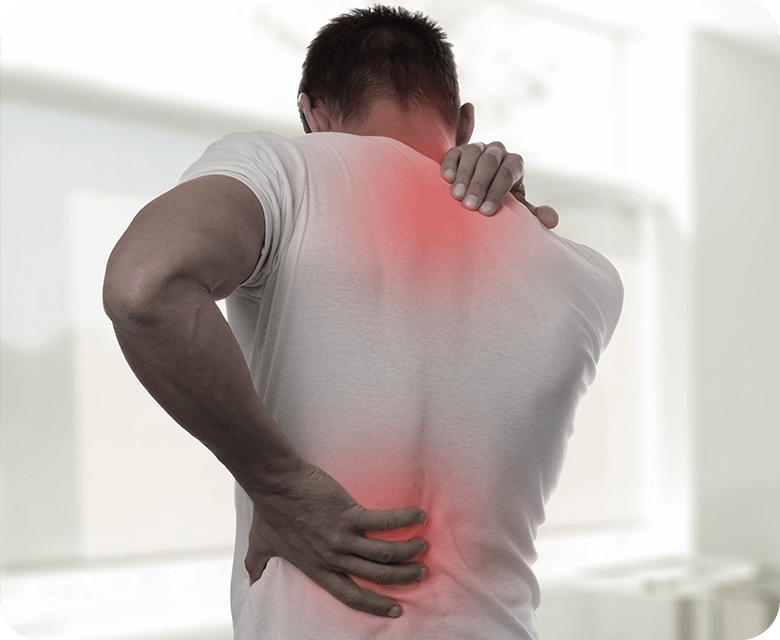 Man holding his back and shoulders in pain