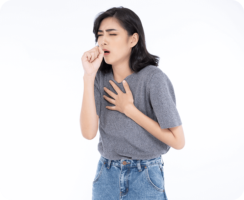 Young Asian woman coughing holding her chest in pain