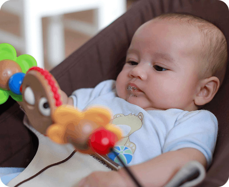  Close Up of Baby Looking At Toy