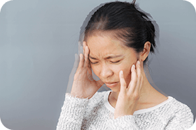 young woman suffering from migraine