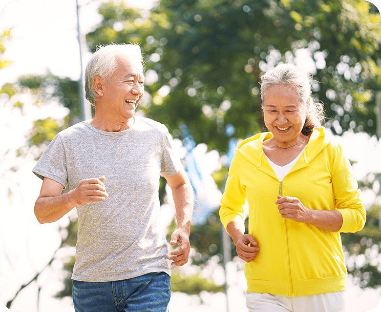 happy asian senior couple running exercising