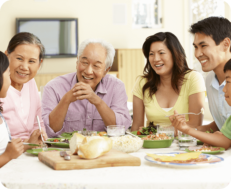 asian family sharing meal at home