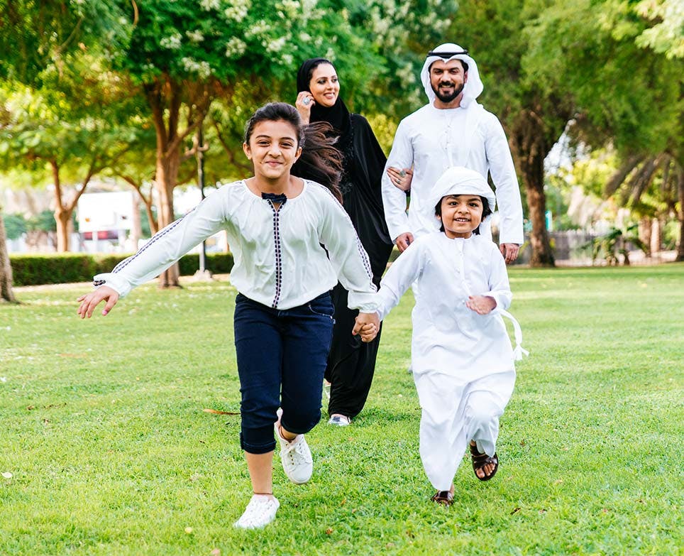 A family walking outdoors A family walking outdoors