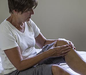 A woman dealing with knee pain