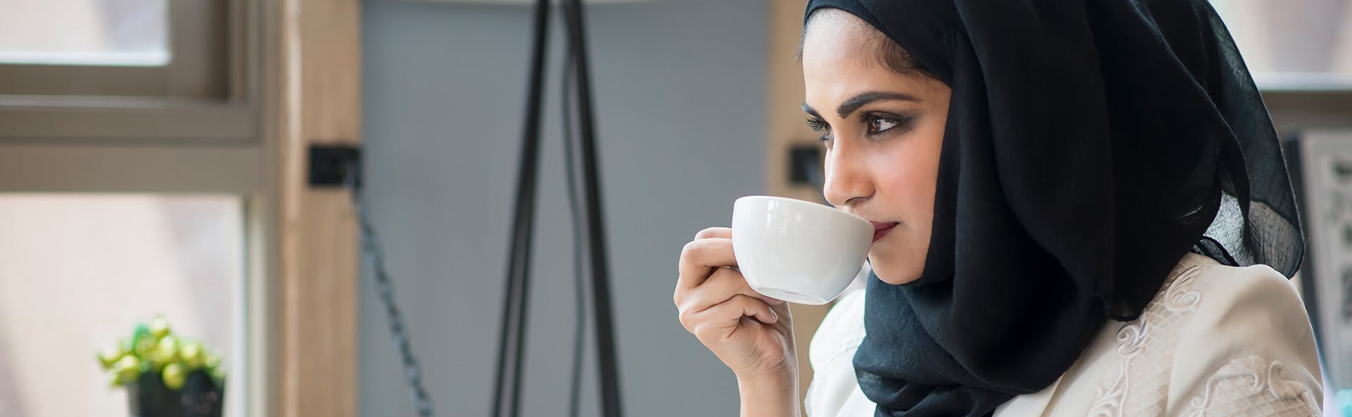A woman drinking tea A woman drinking tea