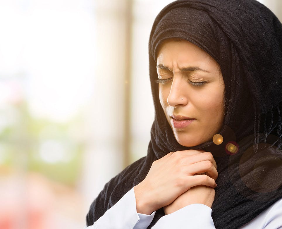 A woman with a sore throat A woman with a sore throat