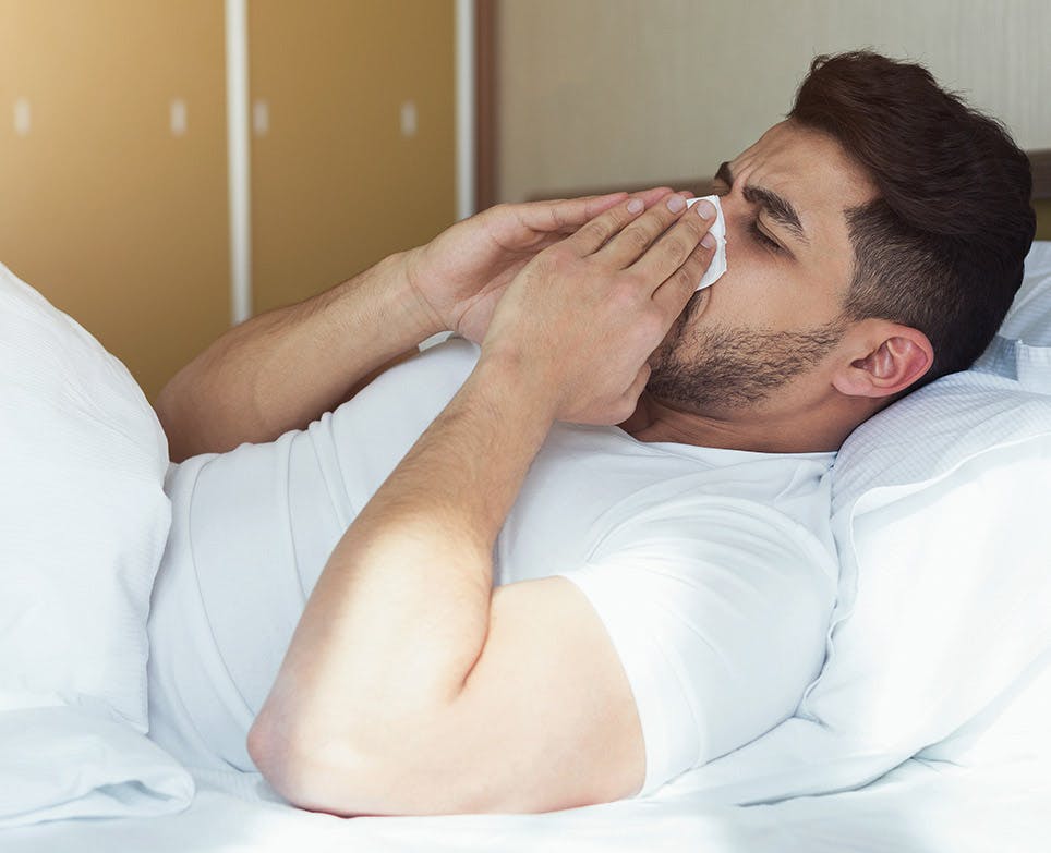 An ill man in bed An ill man in bed