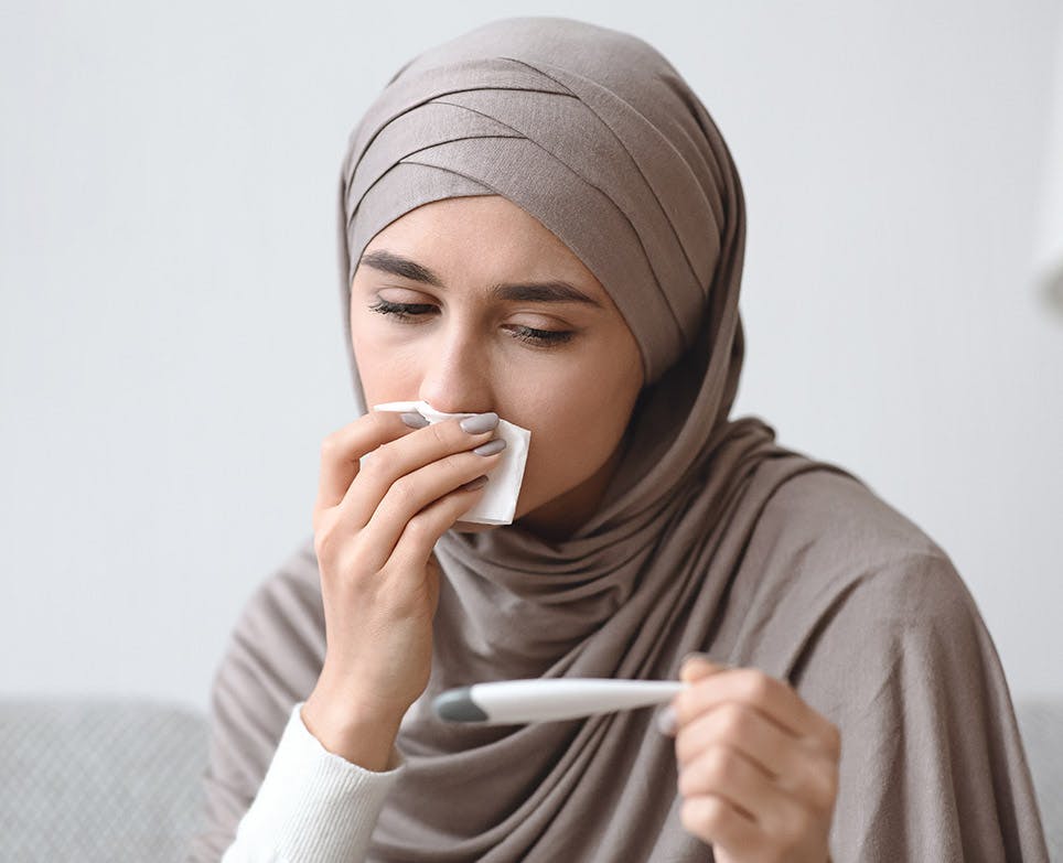A woman suffering from an intense fever
